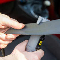 Recessed seatbelt cutter